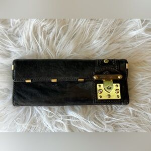 Sold Juicy Contour Black Leather tri fold clutch wallet